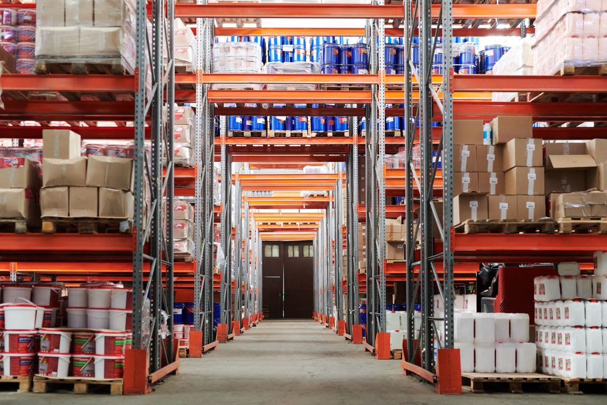 Warehouse aisle with palletized freight on industrial racking