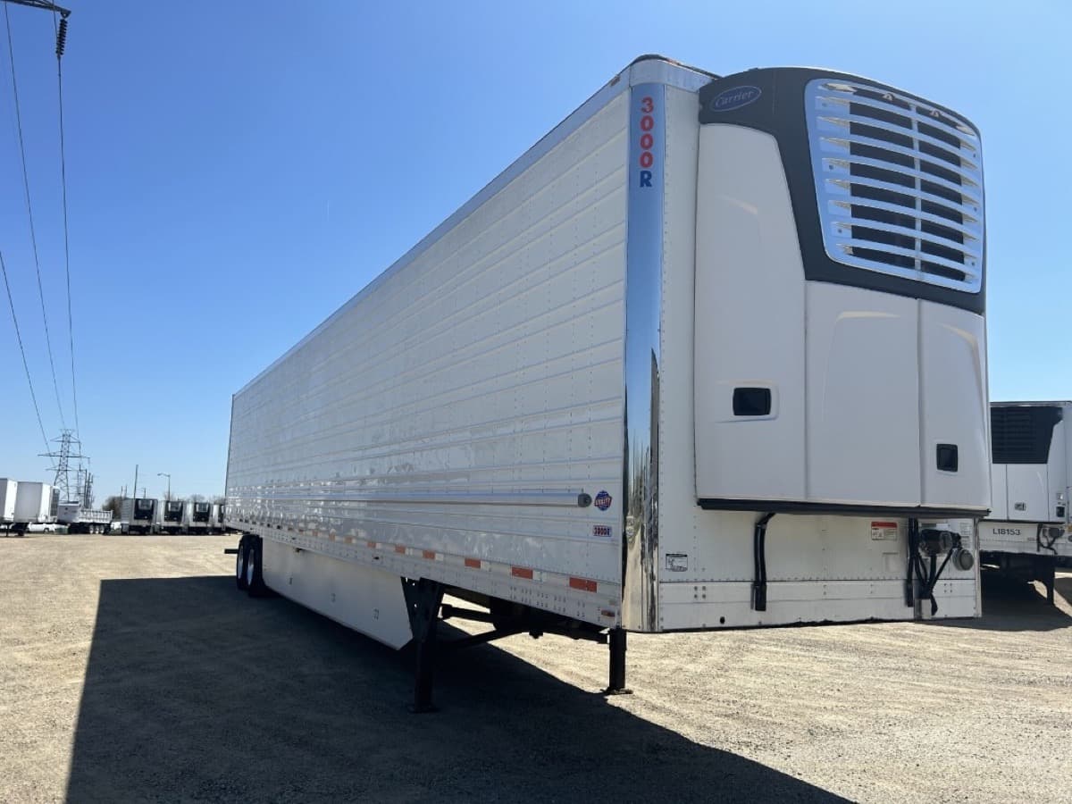 Refrigerated semi-trailer with visible Carrier reefer unit